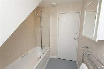 Family bathroom with overhead shower