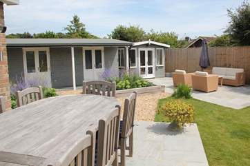 There is ample outside seating to relax in the sun