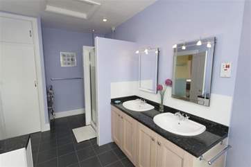 Twin sinks in the family bathroom; one for him one for her!