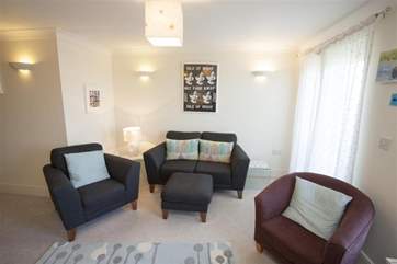 Enjoy the views from the small balcony just off the living area