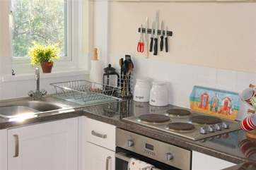 The kitchen is well equipped and compact