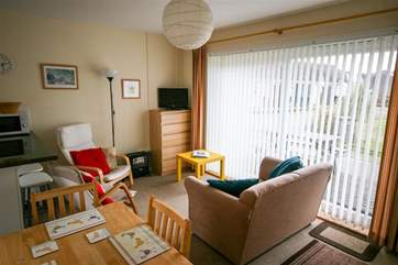 The open plan living room and dining-area
