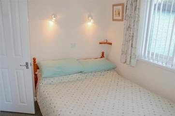 The double bedroom with views out to the grounds