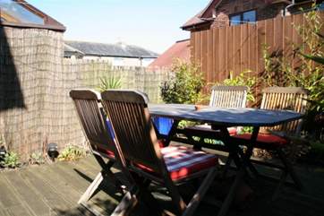 Outside dining on the enclosed patio