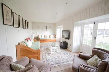 Kick off your shoes and relax in the living room after a long day exploring the beautiful Island