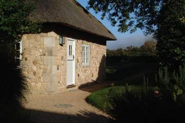 Afton Lodge shares the driveway with Afton Thatch Cottage