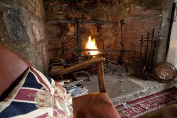 A wonderful large open fire in the living room, ideal for a family chat, playing a board game or just curling up to read a book