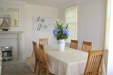 Light and airy dining-area. There is attention to detail all the way through this beautiful apartment