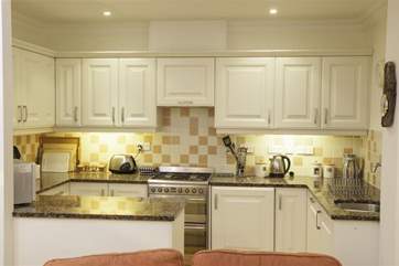 The kitchen is fully equipped and modern