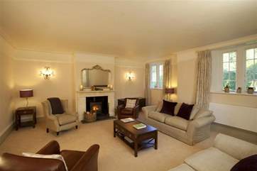 The sitting-room is extremely spacious and a relaxing haven to curl up and unwind in.