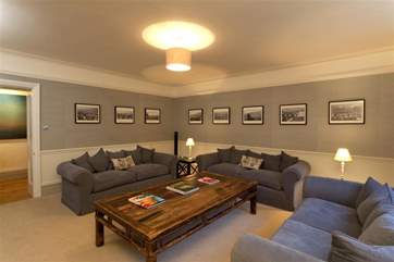 The second sitting-room is more of a home entertainment room for all ages.