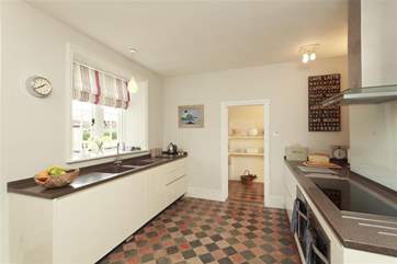 The farmhouse kitchen is both modern and superbly equipped.
