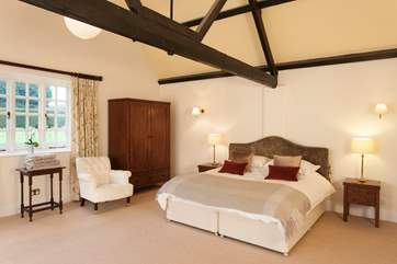 The master bedroom is lovely, large and light