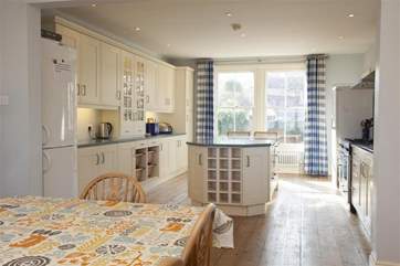Looking from the dining area to the kitchen