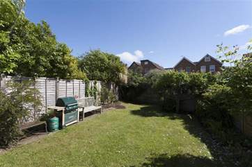 As the sun sets, enjoy a BBQ in the fully enclosed garden