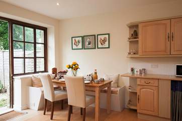 The open plan kitchen/dining area is a great spce for eneteraining whilst cooking up a treat