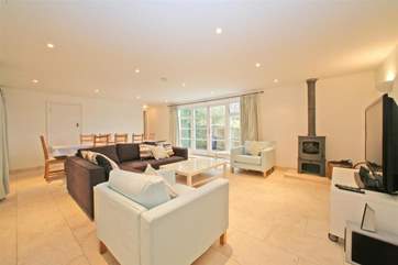 The spacious living room in the converted boathouse