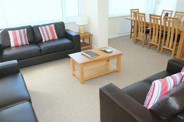 The open plan living area was recently refurbished with new furniture and provides ample seating for a large group.