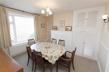 Host dinner in the dining room with plenty of space for 6 people