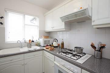 Cook up a treat in the well-equipped kitchen.