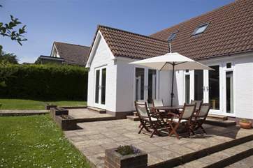 Large patio area with garden furniture