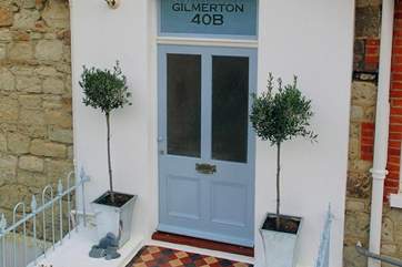 Private entrance - the property is built on a hill so is entered via a couple of steps from the road to this first floor apartment
