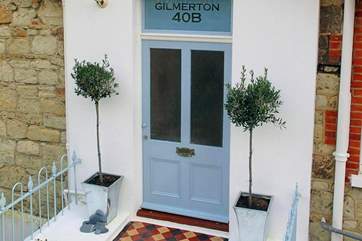 Private entrance - the property is built on a hill so is entered via a couple of steps from the road to this first floor apartment.