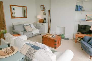 The light and airy sitting-room.
