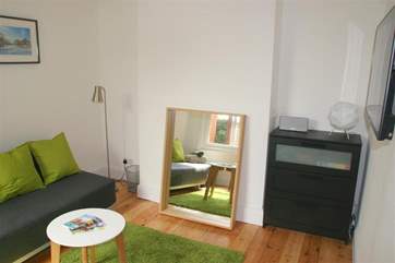 The family room has additional soft seating