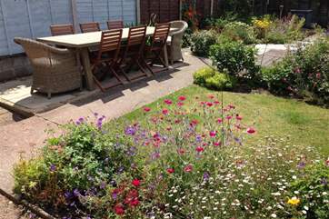 Rear garden with outside dining furniture