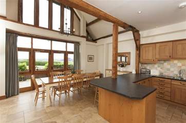 Kitchen & Dining area leading onto decked outside dining area