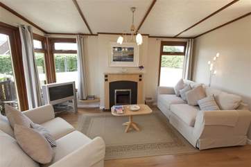 Light living area with access to decking