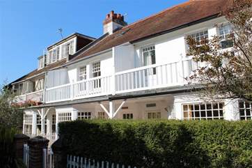 Hillside is located on a narrow track, a short walk from the popular beach at Seagrove Bay