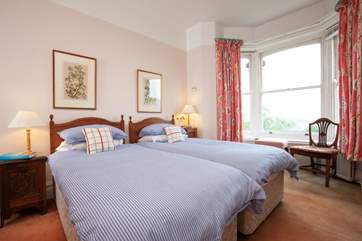 The large twin room offers lovely views out to the sea.