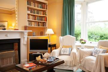 A comfy sitting room is the perfect place for lounging after a day on the beach.