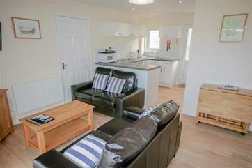 Living area through to Kitchen