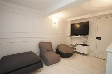 The snug/games-area is an ideal spot for teenagers.