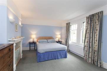 The master bedroom is both comfortable and peaceful