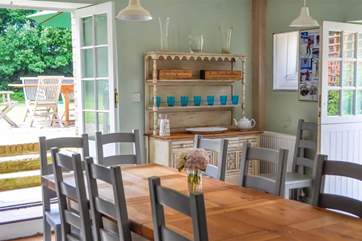 Dining area in Kitchen with doors to garden