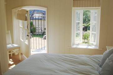 Double bedroom with a twist of France overlooking the peaceful courtyard