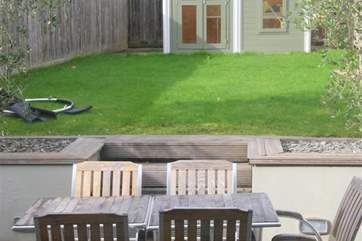 Patio with steps to the lawned area