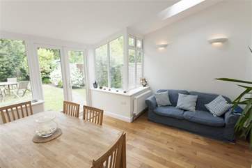 Dining and soft seating area in open plan kitchen
