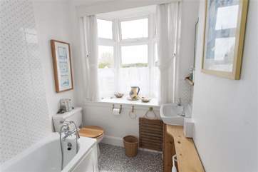 Family bathroom with shower over the bath