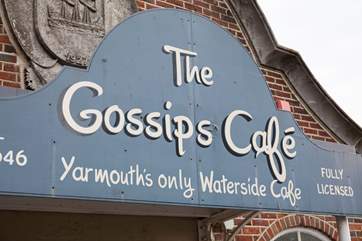 Watch the ferries sail into port from Gossips Cafe, Yarmouths only waterside cafe with fabulous tea and cake