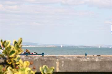Enjoy watching the yachts sail past from the end of the garden