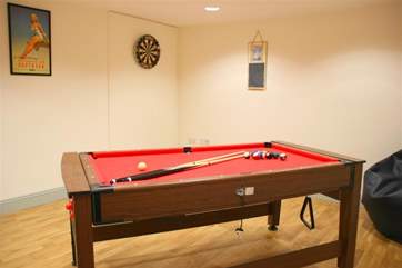 Once tired of the snug and the books, why not play a game of pool