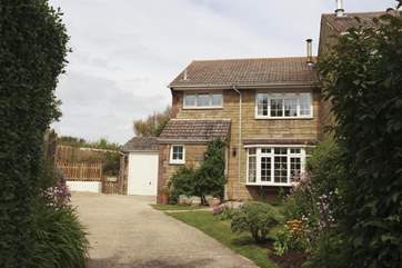 September Cottage with the parking area