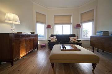 Living-room with views out to the gardens
