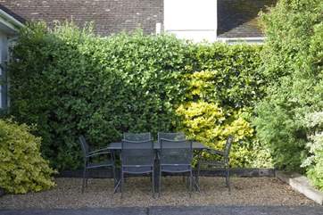 Outside dining area in the enclosed garden