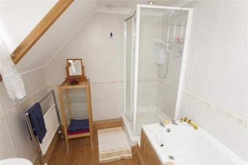Family bathroom with walk in shower and bath tub